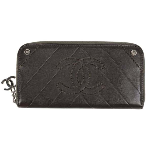 Chanel V-stitch round zipper long wallet with Coco Mark and chevron design b...